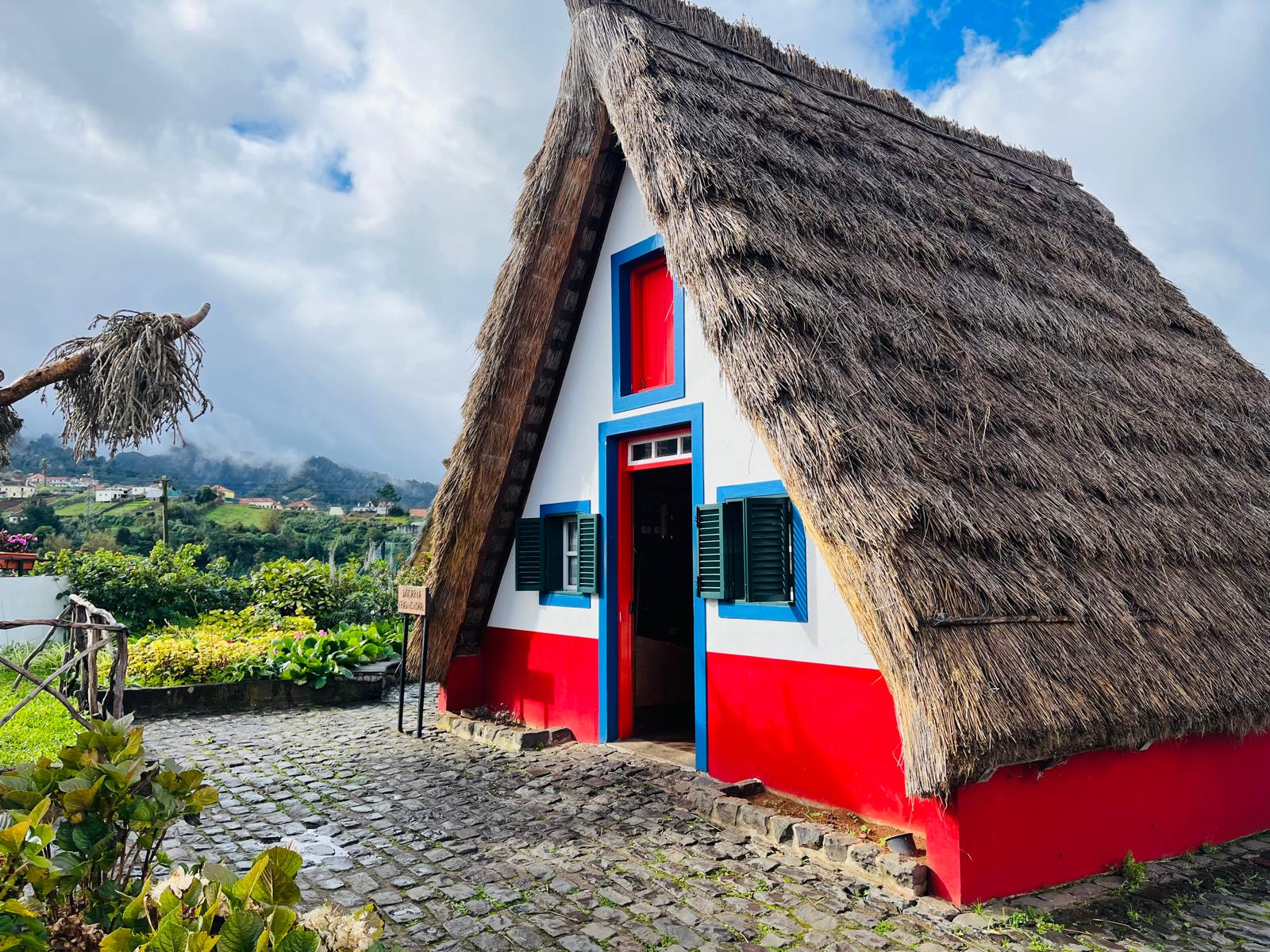 Red and white hut in the nature
